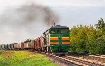 Freight train hauled by diesel locomotive. Belarusian railway
