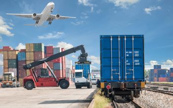 forklift handling container box loading to freight train